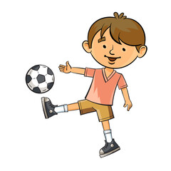 A young football player hits the ball