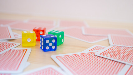 Playing cards and colorful dice_01