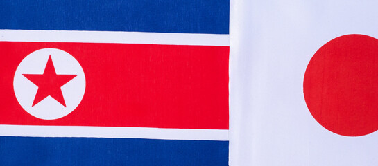 Japan against North Kores flags. Sanctions, war, conflict, Politics and relationship concept