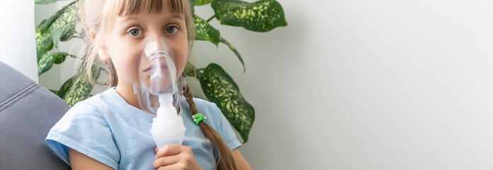 Little girl making inhalation with nebulizer at home. child asthma inhaler inhalation nebulizer steam sick cough concept. - obrazy, fototapety, plakaty