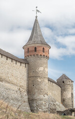 Tower in the castle wall. Tenchyn Tower (another name - Dzhevytska) - fortress tower № 10 of the Old Castle of Kamianets-Podilskyi, Ukraine.