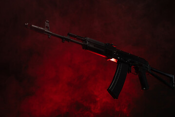 kalashnikov assault rifle in smoke