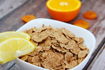 dry diet muesli and yellow lemon slices