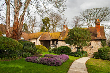 Old traditional medieval stone English house closeup
