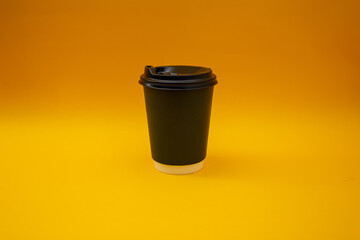 Disposable plastic cup on background, social problem, environmental disaster