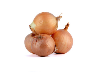 Fototapeta premium Several bulbs of onions on a white background.