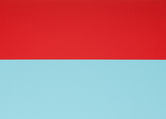 Naklejka premium Two-color background made with 2 cardboards. Red and light blue colorway
