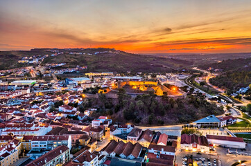 Fototapeta na wymiar Aerial view of the Torres Vedras Castle near Lisbon in Portugal at sunset