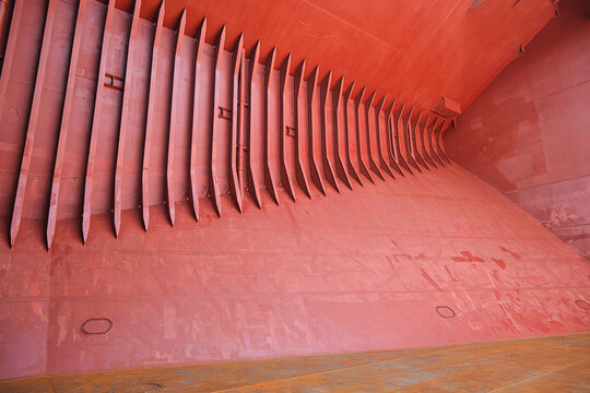 View of bulk carrier cargo hold's side framing with hopper plating