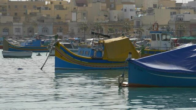 Marsaxlokk, Malta with brightly painted boats