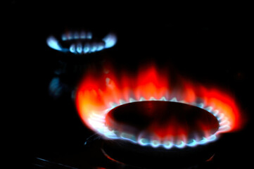 gas burner with burning gas. dark background