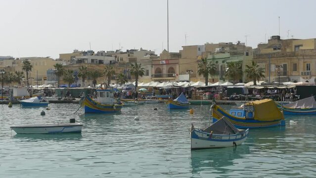 Marsaxlokk, Malta with brightly painted boats