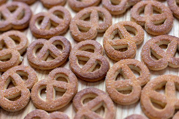 Cookies with sugar sprinkles on a wooden table
