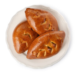 Plate with delicious baked patties on white background, top view