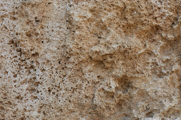 Sandstone old surface texture. Yellow stone background