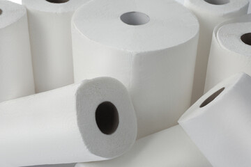 Rolls of paper towels as background, closeup view