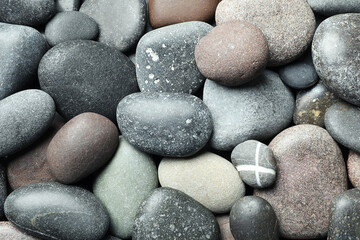 Many different stones as background, top view