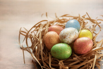 Colorful easter eggs on wooden background. . Happy Easter background.
