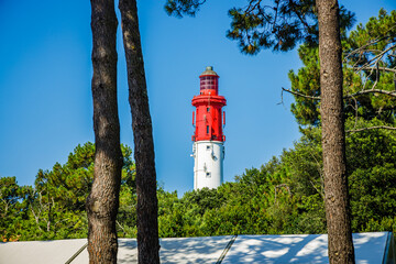 Cap Ferret lighthouse on the Arcachon bay, on a summer day in France - obrazy, fototapety, plakaty