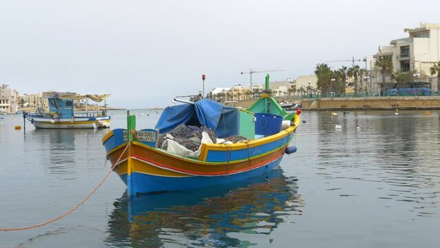 brightly painted boats in Marsaskala, Malta