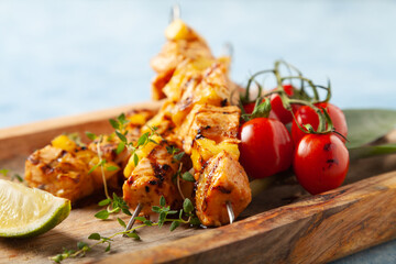 Grilled shashlik with salmon and pineapple. Served with yoghurt sauce.