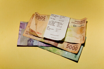 Coins change on the receipt. Indonesian rupiah currency