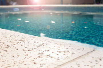 Edge of a pool with flash and copy space.