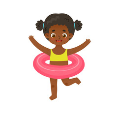 Adorable baby girl with rubber ring. Pretty african american girl with swimming circle on the summer beach.