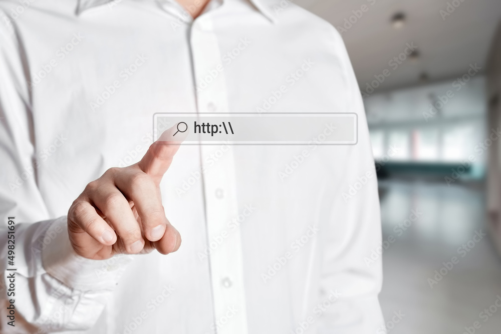 Poster businessman press the search icon on the internet search bar on a virtual screen with the word http.