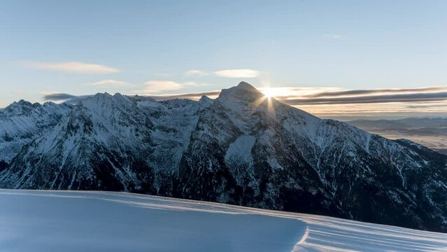 Timelapse of winter sunrise over the Krivan peak - the symbol of Slovakia in High Tatras mountains national park
