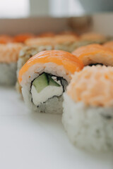 Philadelphia sushi with red fish and cucumber