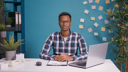 POV of employee attending video call conference at desk, talking to people on remote teleconference. Businessman using online telecommunication on videoconference call meeting. Internet discussion