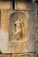 Obraz premium Tyche with the inscription “Fortune of the city, be ever victorious, good luck”. Myra Ancient City. Demre, Antalya, Turkey.