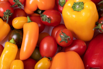 Full frame shot of fresh tomatoes and bell peppers, copy space