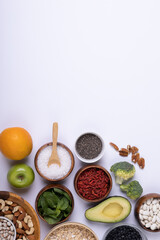 Directly above shot of various food and ingredient on white background, copy space