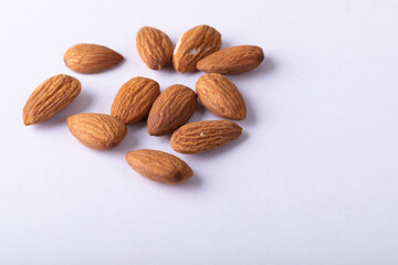 Close-up of almonds on white background