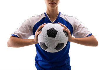 Midsection of biracial young female soccer player holding soccer ball against white background - Powered by Adobe