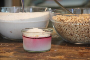 Malabi served with nuts and coconut shavings 