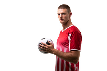 Side view portrait of confident male caucasian soccer player holding ball over white background