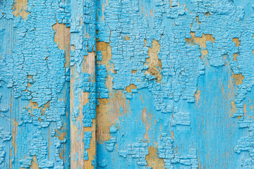 Texture wooden painted surface with cracked paint