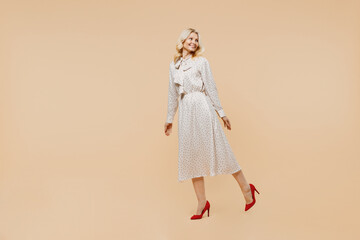 Full size body length cheerful charming fancy elderly gray-haired blonde woman lady 40s years old...