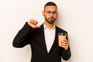 Young business hispanic man holding takeaway coffee isolated on white background feels proud and self confident, example to follow.