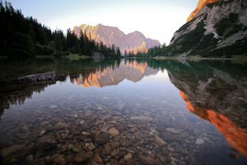 Obraz premium Mountain Lake in the Austrian alps, with clearly reflections