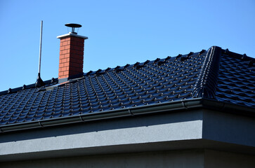 roof tiles made of black burnt tiles. earth wire must be installed on each gray roof, which copies...