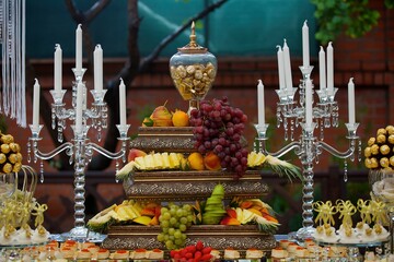 Sweet table candy bar on a holiday in honor of a wedding or children 's holiday.