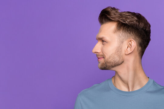 Profile photo of nice brown hairdo guy look empty space wear blue shirt isolated on violet color background