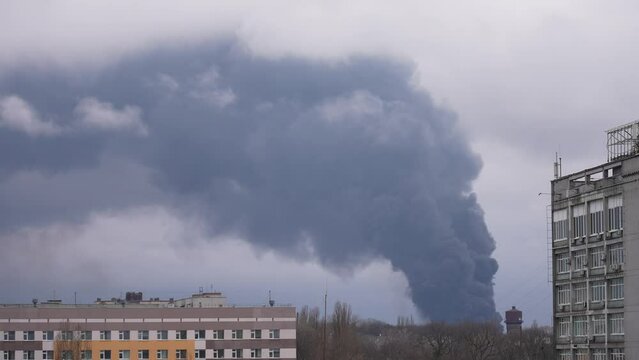 4k video footage of burning building in ukrainian city Chernihiv near Kyiv on north of Ukraine. Infrastructure of city attacked by enemy aircraft troops or artilllery. War of Russia against Ukraine
