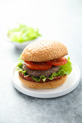 Traditional homemade burger with fresh tomato