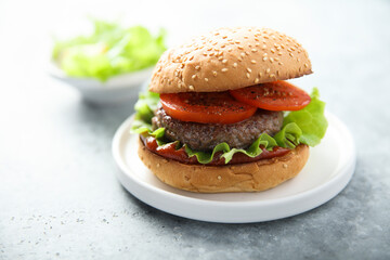 Traditional homemade burger with fresh tomato