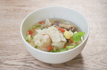 boiled bamboo mushroom with pork bone soup on bowl